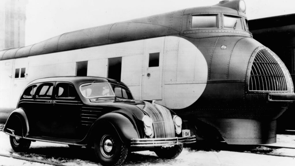 1934 Chrysler Airflow with the then-new 1934 Union Pacific M-10001 streamlined train